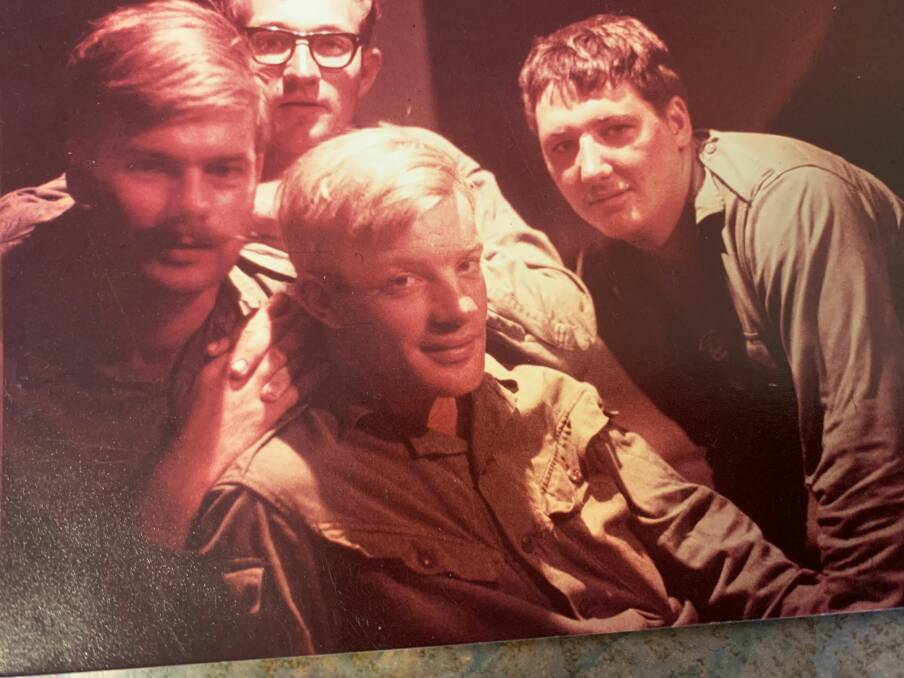 Ken Lummis, Barry Davis, Alwyn Craig and Steve Smith in a tent at Nui Dat in late 1969.