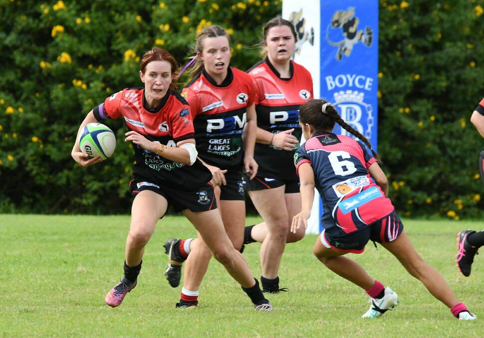 Hannah Yates makes a dash for Gloucester in a clash against the Manning Ratz. She has been named in the Lower North Coast side to play Mid North Coast.