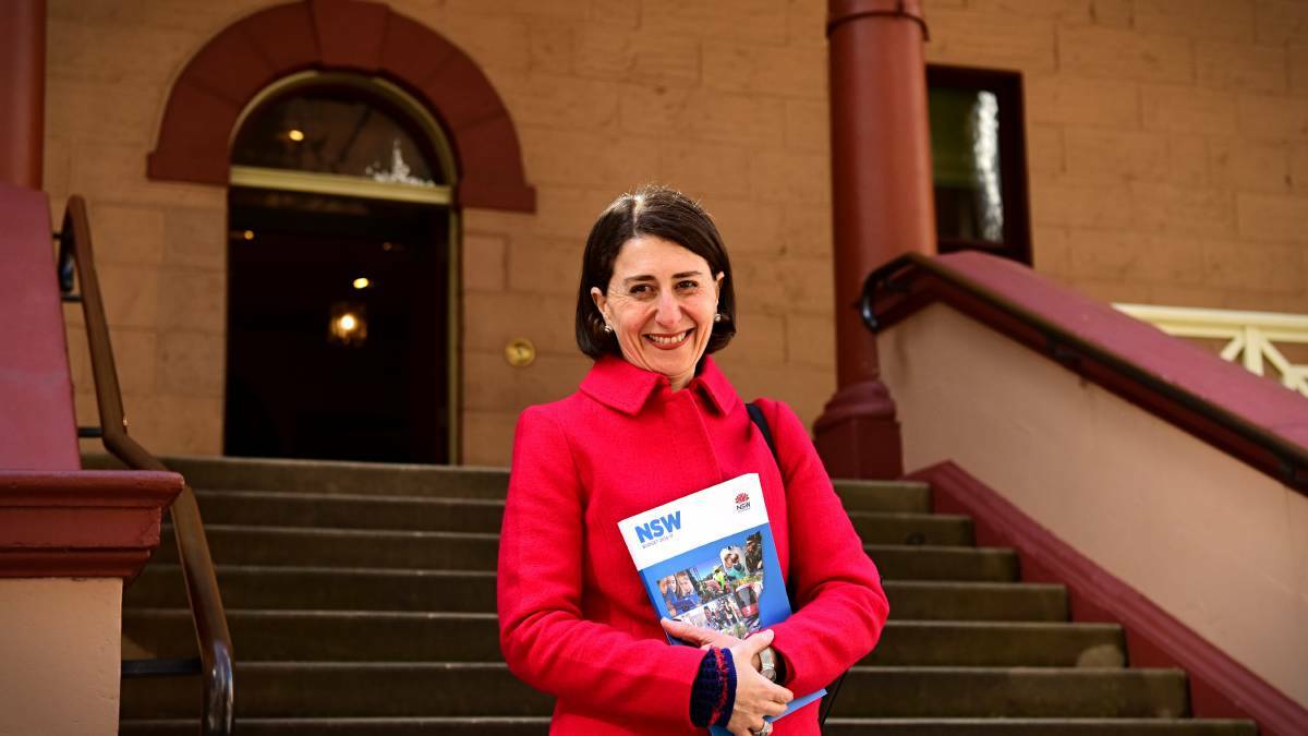 BUDGET 2016: NSW State Treasurer Gladys Berejiklian poses with the 2016/17 budget papers outside State Parliament House. Picture: Wolter Peeters