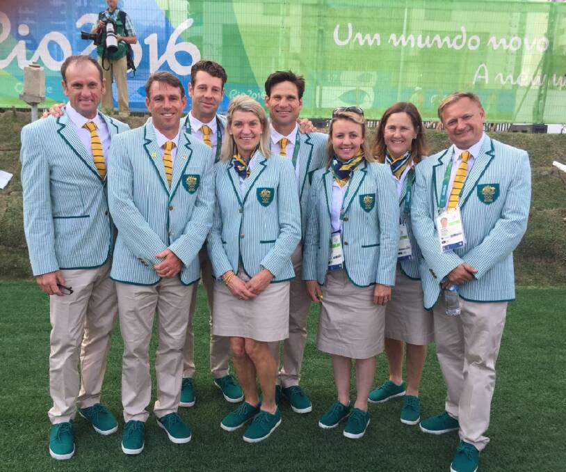 Chris Webb (far right) with Kitty Chiller (middle) and the Australian Equestrian team. 