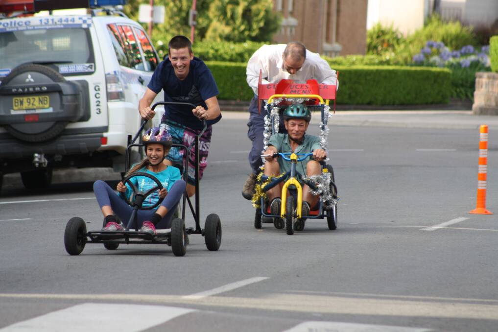 An old favourite reinvented: A billy cart race from a past APEX Christmas Festival with competitors racing down Church Street in Gloucester. Picture: Gloucester Advocate
