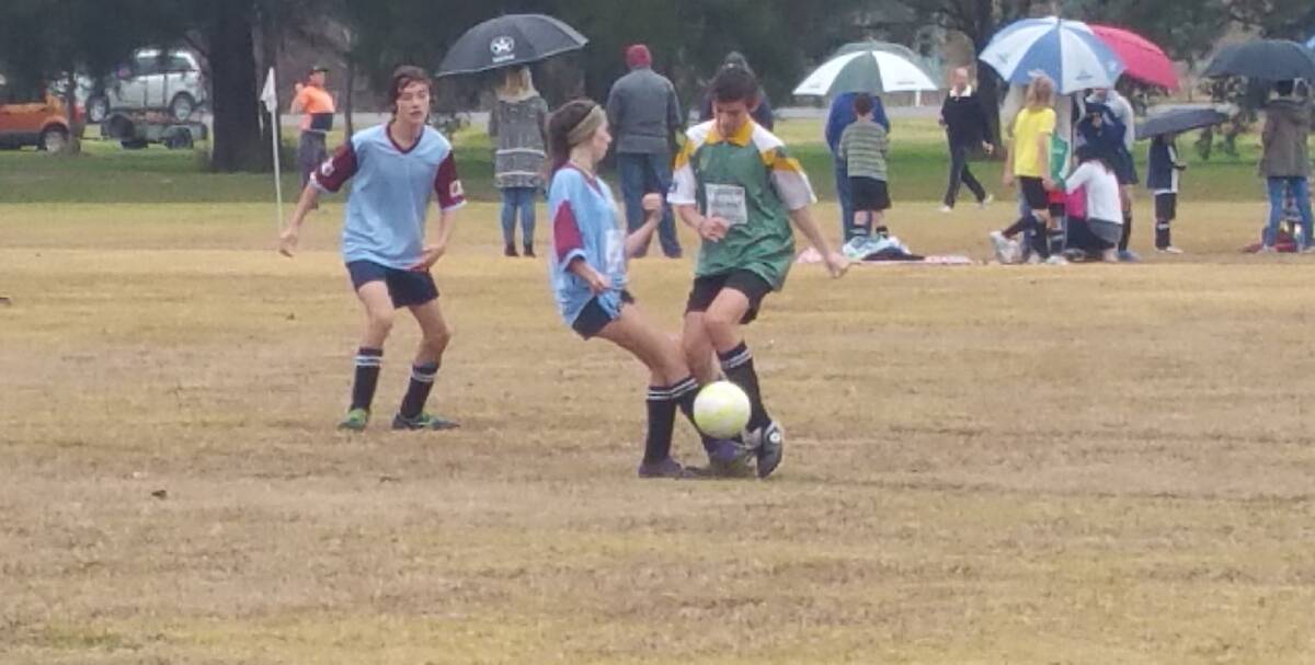 Ella Blamires shows off her great defence technique as she tries to get the ball away from Sam Ballantine.