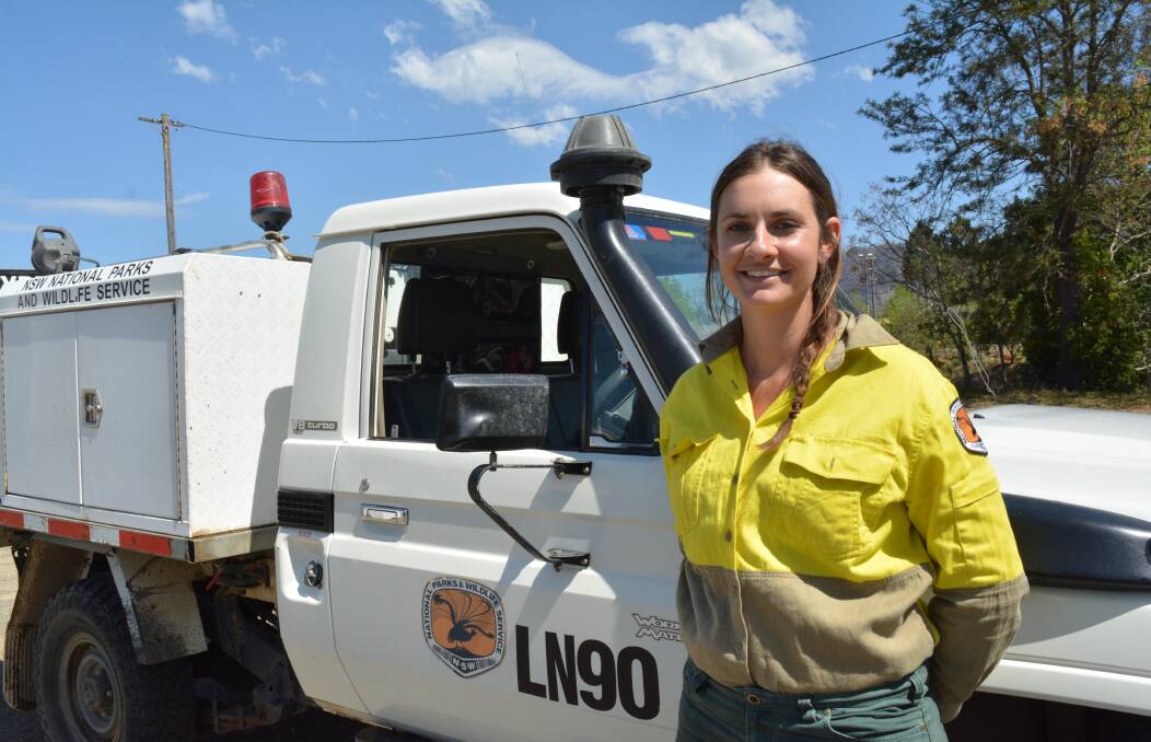 Fire fighter: Emily Smith is part of the NWPS Enchanced Bushfire Management Program (EBMP) which helps maintain asset protection zones. Photo: Anne Keen