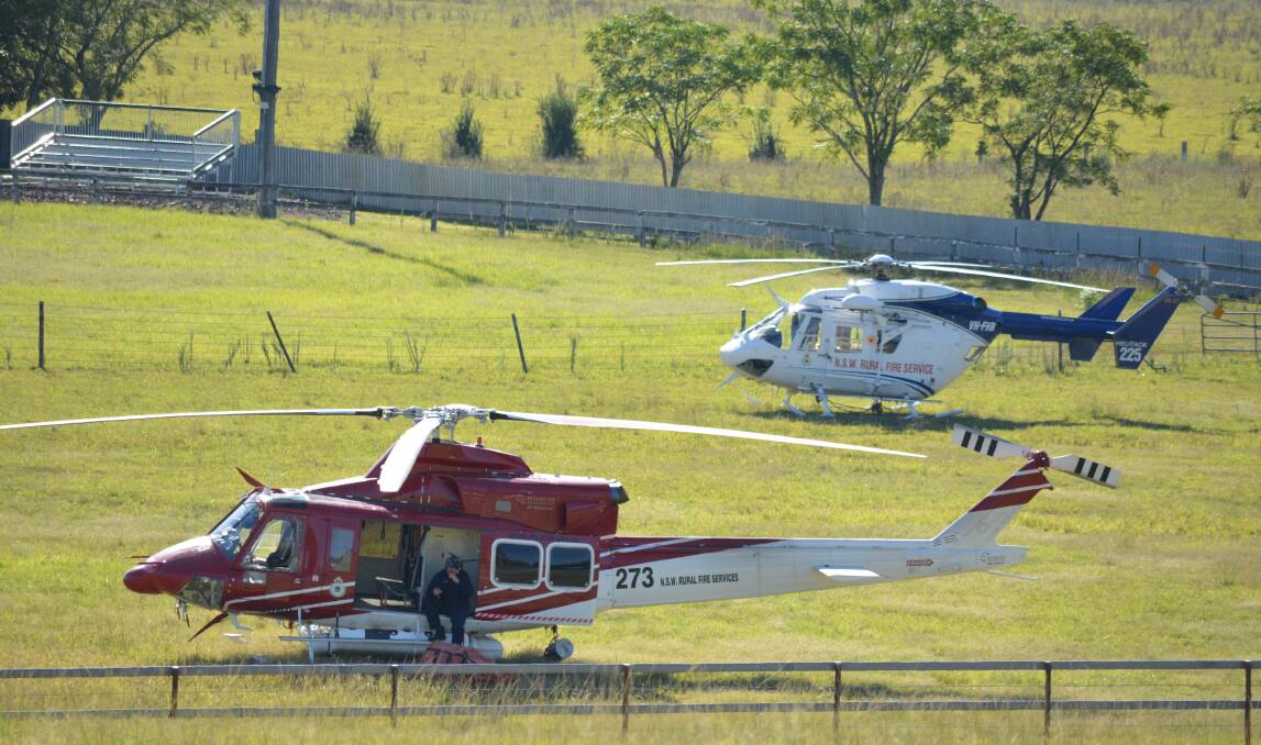 Helicopters are flying in and out of Gloucester Showground in order to fuel and pick up and drop off fire fighting teams. Picture: Anne Keen