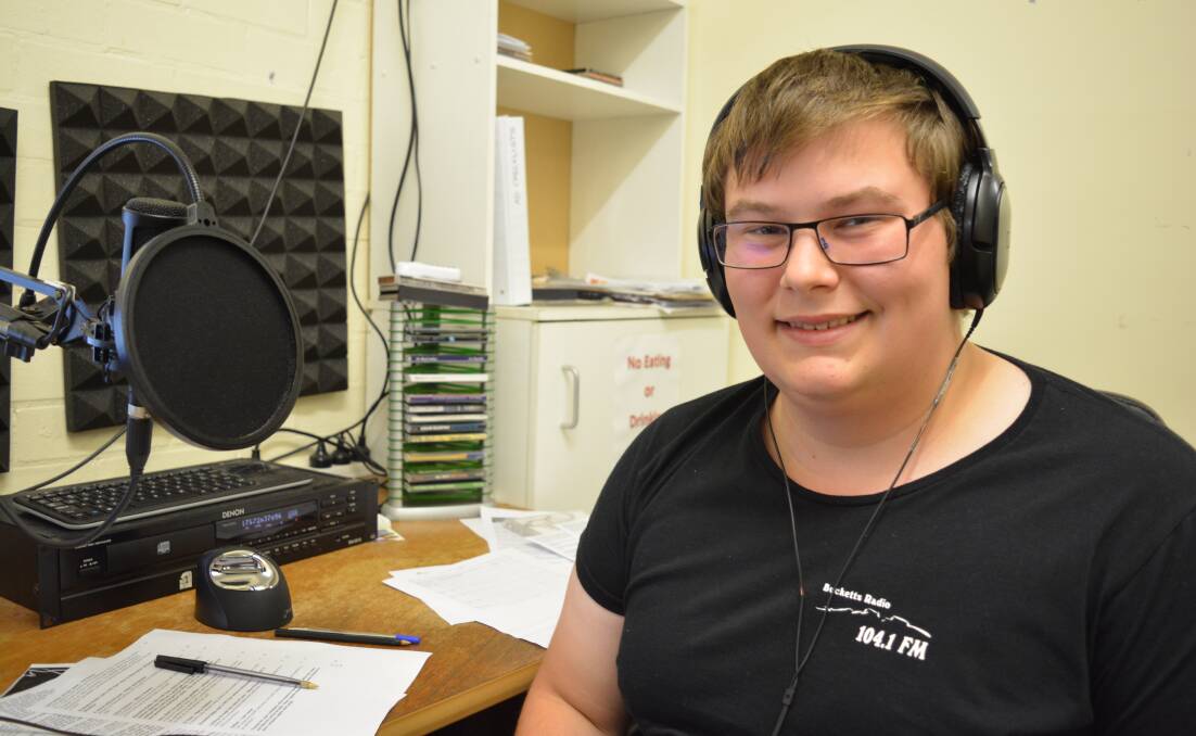 Preparing to go live: Gloucester High student Owen Bithery gets ready to start his show on Bucketts Radio. Picture: Anne Keen