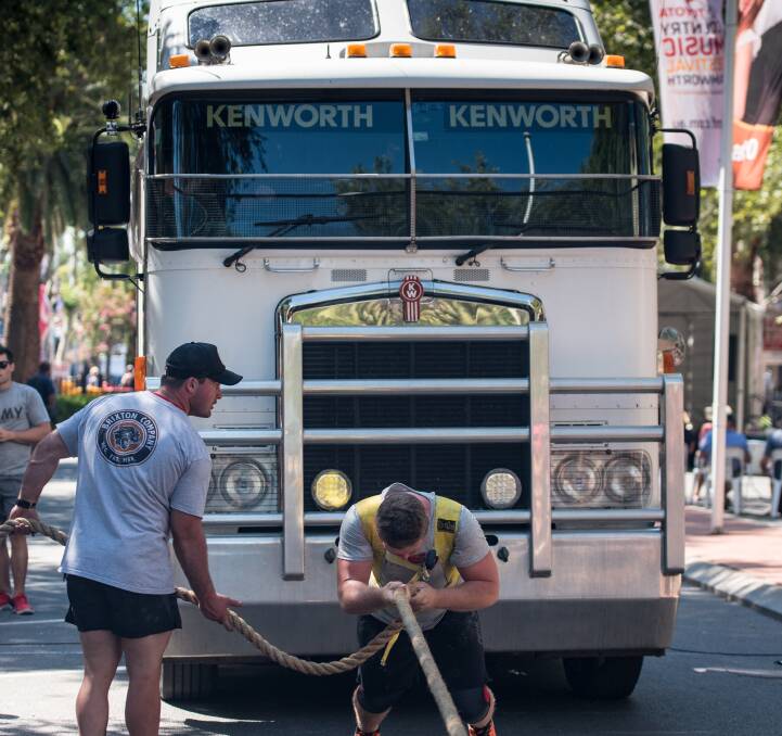Slowly, slowly: Brendon Pearce competing in the truck pull down Peel Street in Tamworth. "You get a fair pump out of it," he said about his favourite event. Picture: fionabarrettphotography