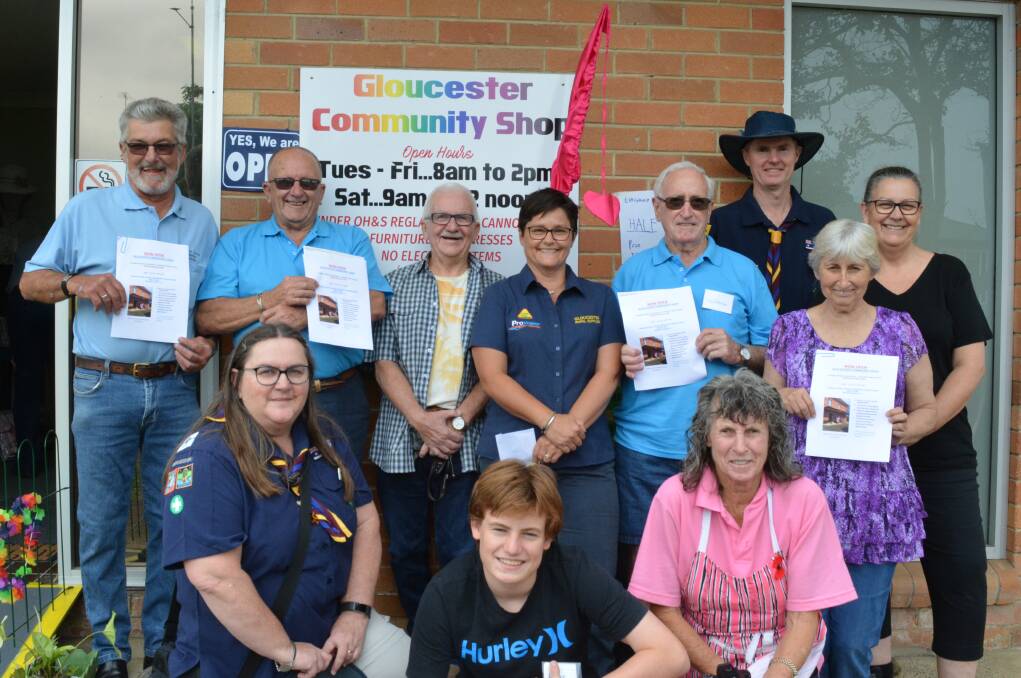 Members from Gloucester Scouts, Gloucester Prostate Cancer, Gloucester Junior Hockey and June's Place join the volunteers for the presentation. Photo Anne Keen