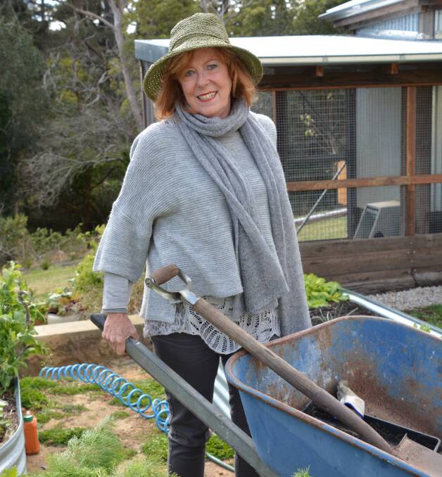Passion: Mary Moody rugged up and ready to garden in the chilly Blue Mountains. Picture: Ilsa Cunningham from the Blue Mountains Gazette