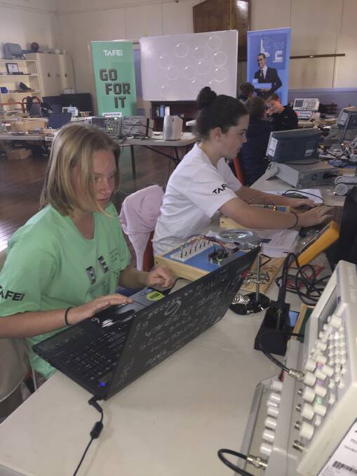 Learning new techniques: Anita Jackson and Jess Stewart take advantage of the programs coming to Gloucester. Photo: Supplied