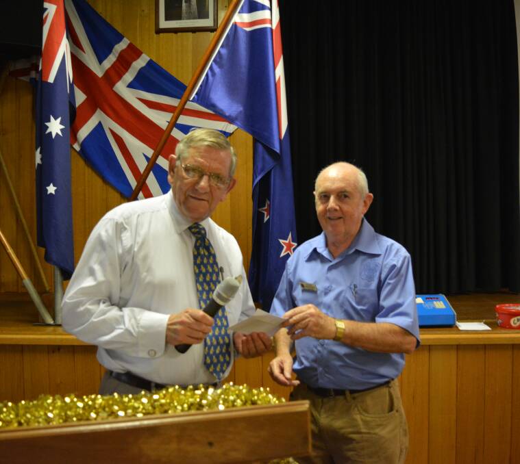 RSL Sub-Branch donation: John Rooimans from Legacy and Frank McGovern from RSL.