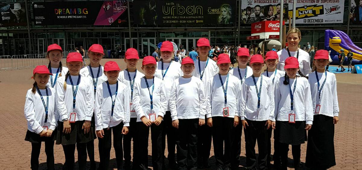The big day: The Gloucester Public School singers outside the Qudos Bank Arena before their first performance at Sydney Olympic Park. Picture: Supplied
