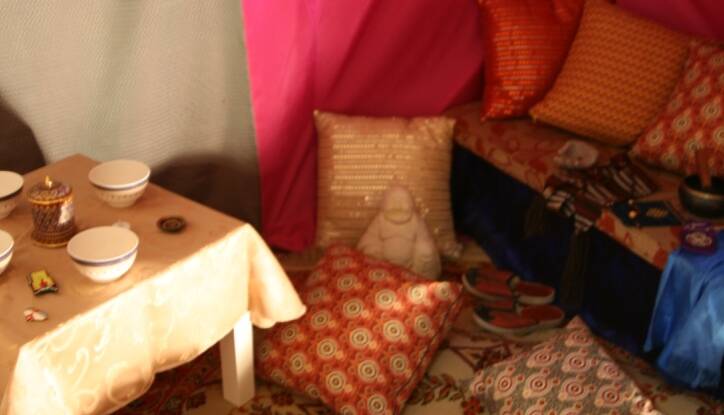 On display: Inside the replica of a Mongolia Yurt, a portable round tent used by nomads that was set up in the hall.