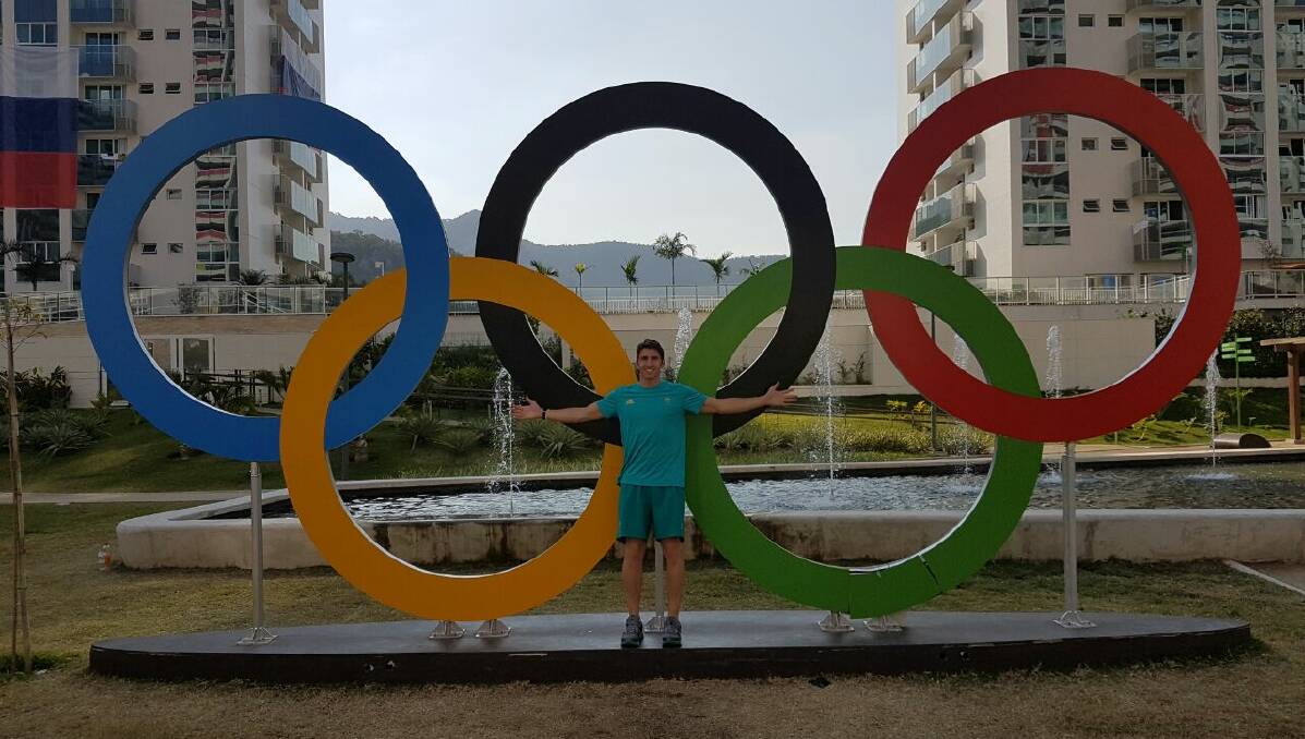 At the athletes village: Damian Martin in front of the Olympic rings in Rio after making it to his first games playing with the Boomers.