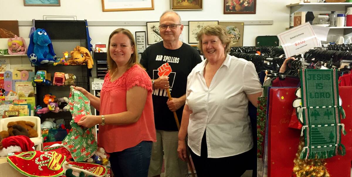 Hard at work: Alison Hester, Gordon and Colleen Hayward in the Majestic Family Store. Picture: Supplied