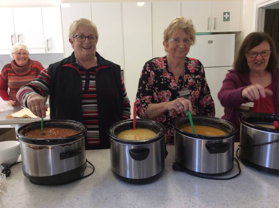 Stirring the pot: VIEW club members, Chris Redman, Rae Davies and Pat Gardner keep the soup from burning. Photo: Supplied