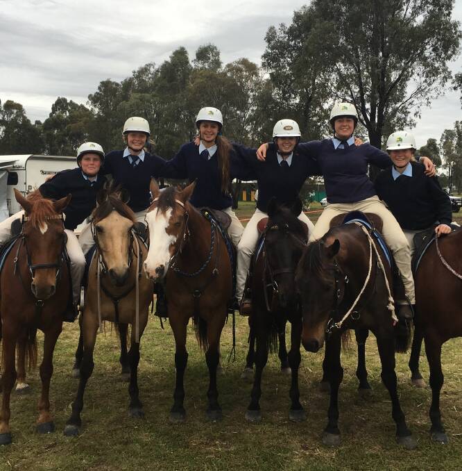 Anthony Shultz, Charlotte Maslen, Natalie Le Rougatel, Emma Johnston, Jodie Harris and Amy Shultz at the Sporting and Campdrafting Championships in Queensland.