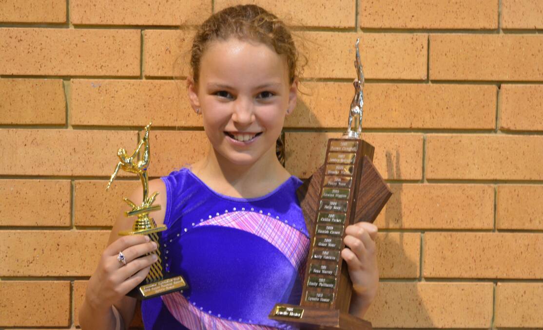 Giving it your all: Lynelle Hester was awarded Most Dedicated Gymnast for 2016 at the award ceremony for working hard all year.