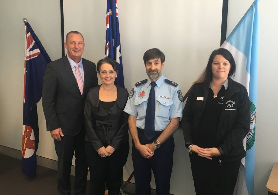 Michael Johnsen with minister Pru Goward, Guy Guina of the Hunter Valley Police LAC and Stacey Gately of the Women’s Domestic Violence Program for Carrie's Place.