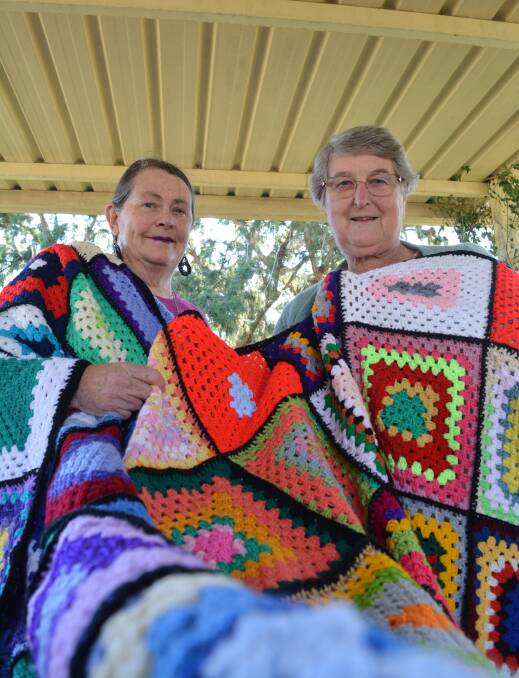 Providing warmth for others: Active Wrap artists, Deborah Brooks and Brenda Macdonald with their latest creations. Photo: Anne Keen
