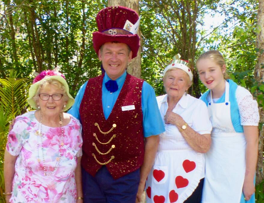 George Hoad at last year’s high tea dressed as the Mad Hatter with his mother Janice, aunt Nola Blyton and niece Charlotte Worth.