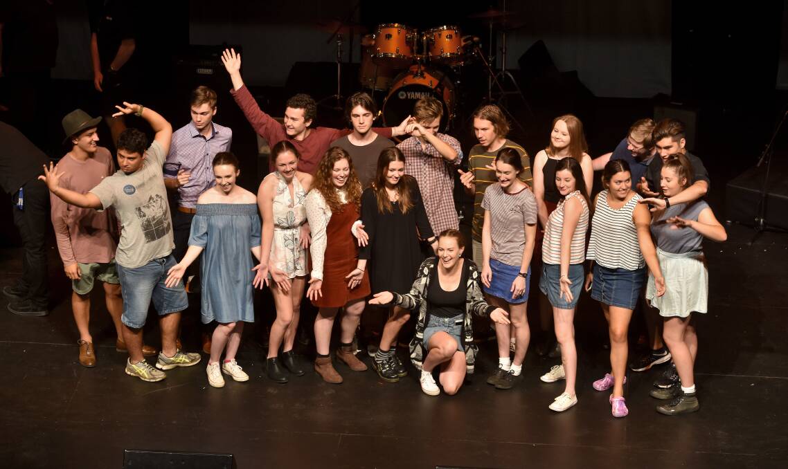 Spot the locals: Hanu Barff and Ben Reynolds enjoy their rehearsals with the other HSC performers at the Glasshouse in Port Macquarie. 