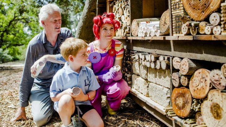 Dr Remko Leijs, Aidan Bavinton, 8, of Maribyrnong Primary School, and ABC TV character Dirt Girl at the launch of the Australian Native Bee Hotel at the Australian National Botanic Gardens.  Photo: Jamila Toderas
