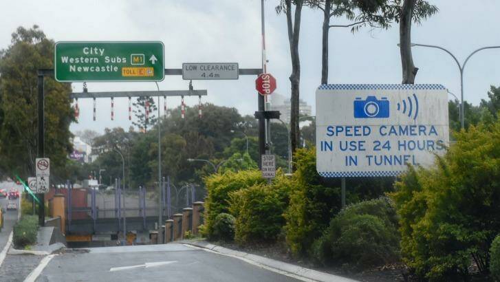 A warning sign about Sydney's most lucrative speed camera on the Eastern Distributor seems to have little effect on drivers. Photo: Brendan Esposito