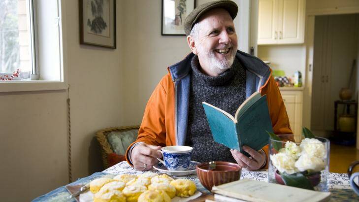Greg Johnson with his early editions of <i>The Canberra Gardener</i> and home-made pumpkin scones. Photo: Elesa Kurtz
