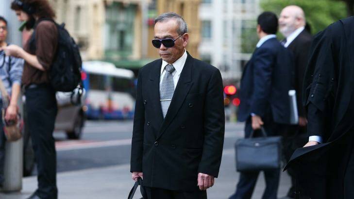 Quy Huy Hoang leaves Downing Centre Local Court on October 20, 2015. Photo: Daniel Munoz
