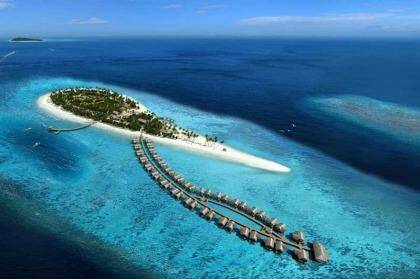Overwater bungalows, pristine white sand beaches and one of the largest infinity pools in the country make Laoma resort in the Maldives a magical tropical destination.