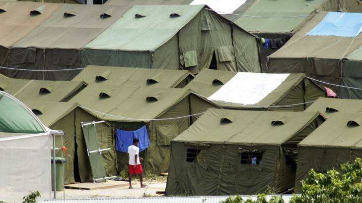 A refugee wanders through the tents at the Nauru detention centre. Photo: Angela Wylie