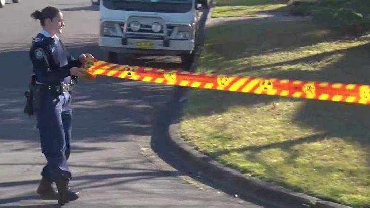 An exclusion zone was enforced and the street was taped off with hazmat symbols. Photo: Top Notch Video