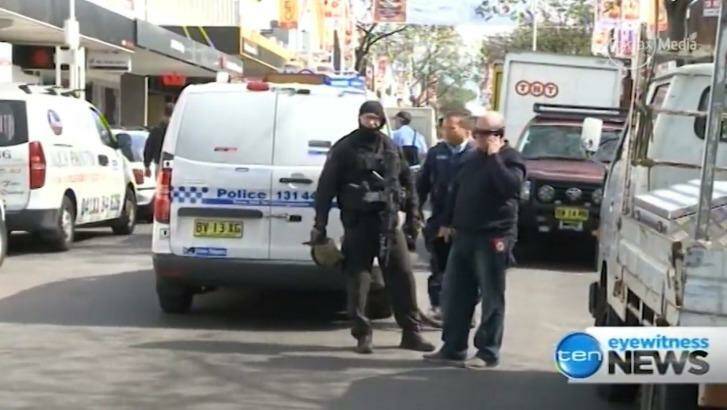 Police at the scene of the attempted robbery in John Street, Cabramatta. Photo: Ten News