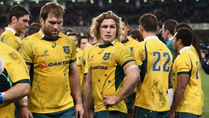 'It's news that you never want to wake up to' ... Wallabies captain Michael Hooper, centre, on the loss of Phillip Hughes. Photo: Ian Walton/Getty Images
