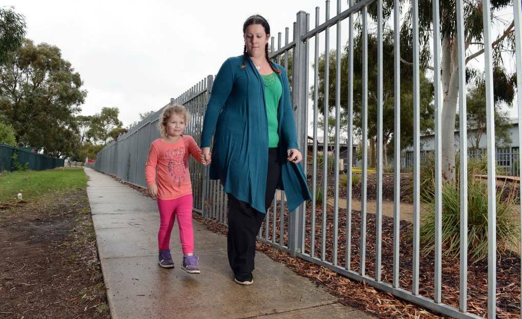 SAFETY FEAR: Amanda Fuller now keeps a close eye on the ground when walking her daughter, four-year-old Astarid Cleary, after she found a needle near her kindergarten. Photo: KATE HEALY