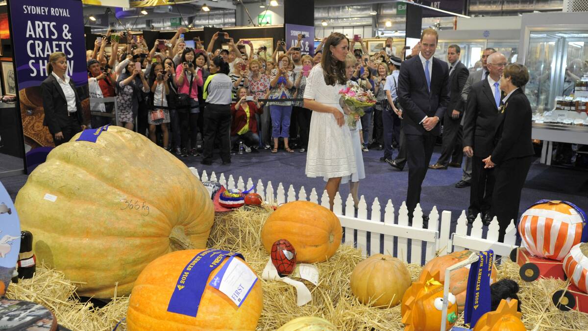 Marianne Paynter presents William and Kate with a bouquet of flowers at the Royal Easter Show. Pic AUSPIC