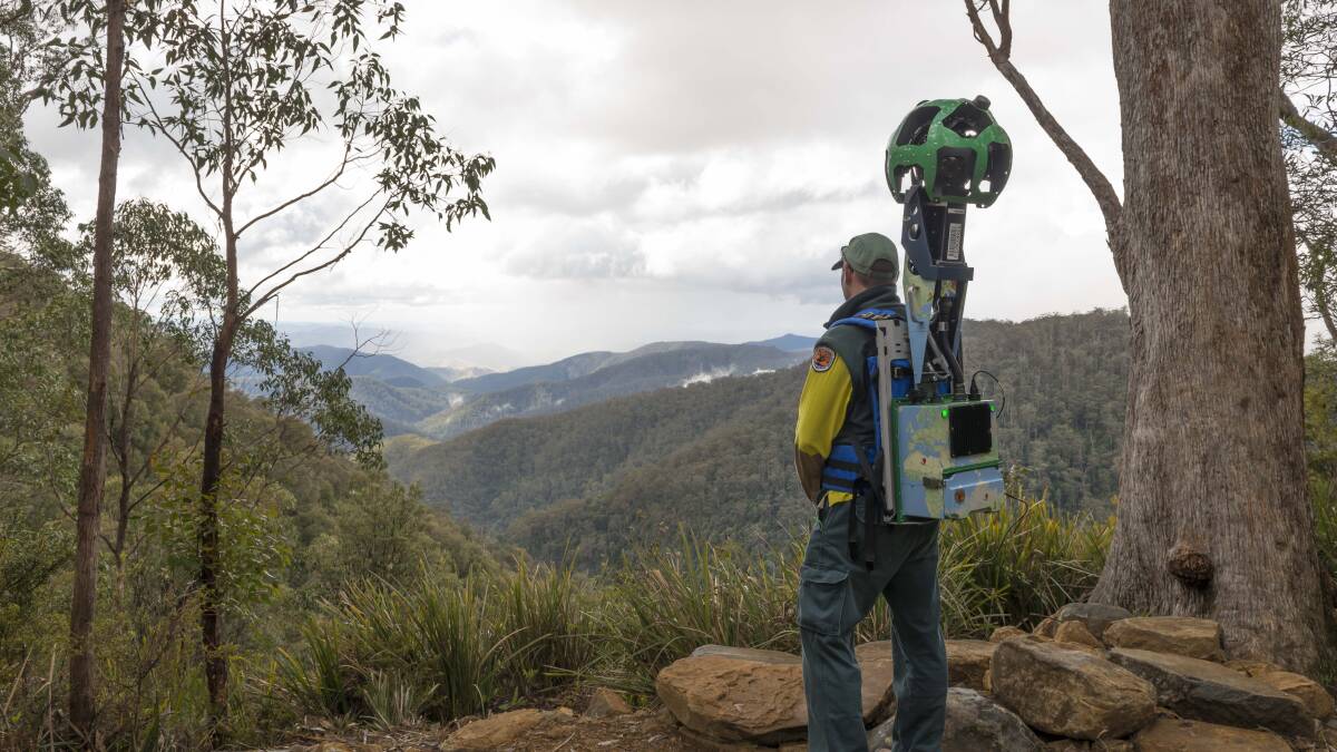 Ranger Peter Beard wearing the Google Street View Trekker at Andrew Laurie Lookout in the Gloucester Tops. Picture courtesy of John Spencer.