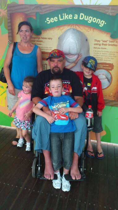 Brenton Teasdale with his wife and three young children.