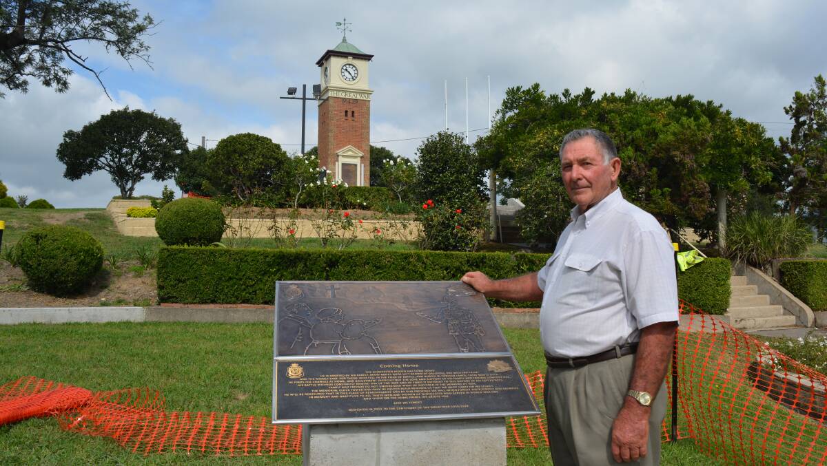 Bob Murray with the plaque the Gloucester RSL sub-branch designed for the Anzac centenary.