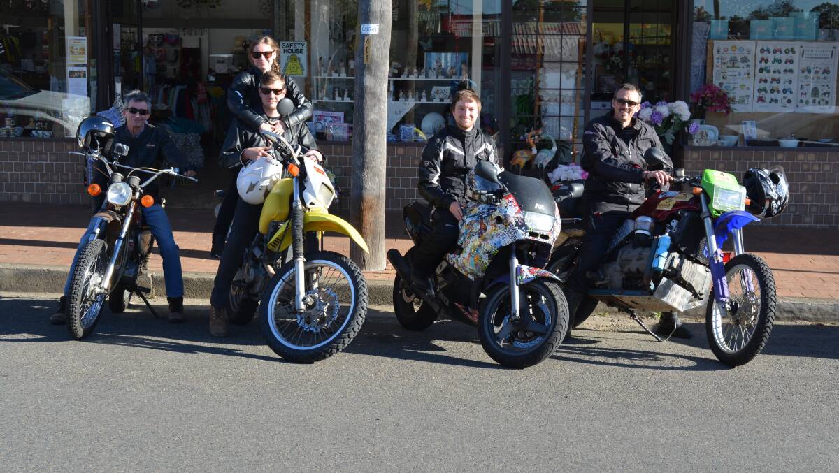 Anthony Signor (right) and friends in Gloucester last Thursday midway through the Scrapheap Adventure Ride.