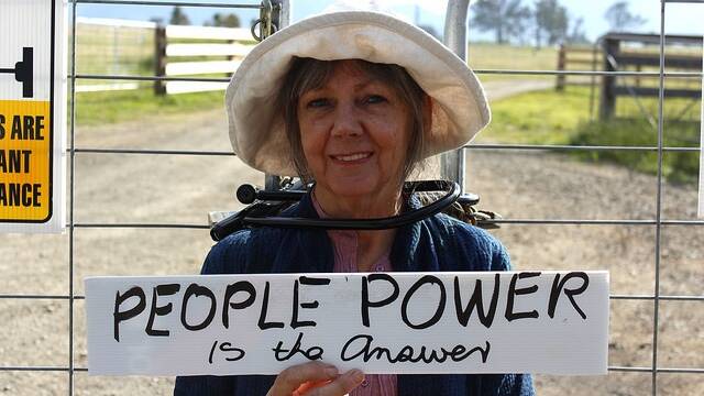Author Sharyn Munro is among more than a dozen people arrested for protesting against AGL's coal seam gas operations in Gloucester.