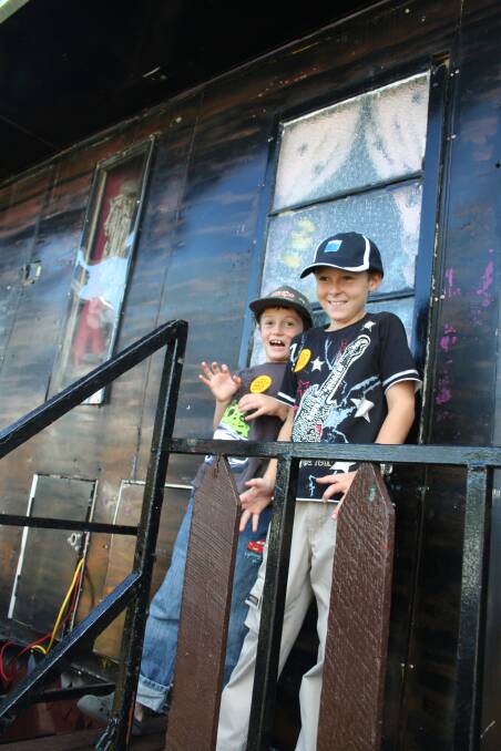 Cael and Bodhi Hickman emerge from the haunted house at the 2009 Gloucester Show.