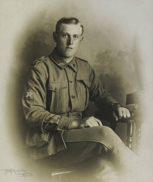 Studio portrait of William Bruce Higgins, from Gloucester, shown wearing a proficiency badge on his right arm for skill in horse driving, the design being crossed whips and spur. Pic Australian War Memorial archives.