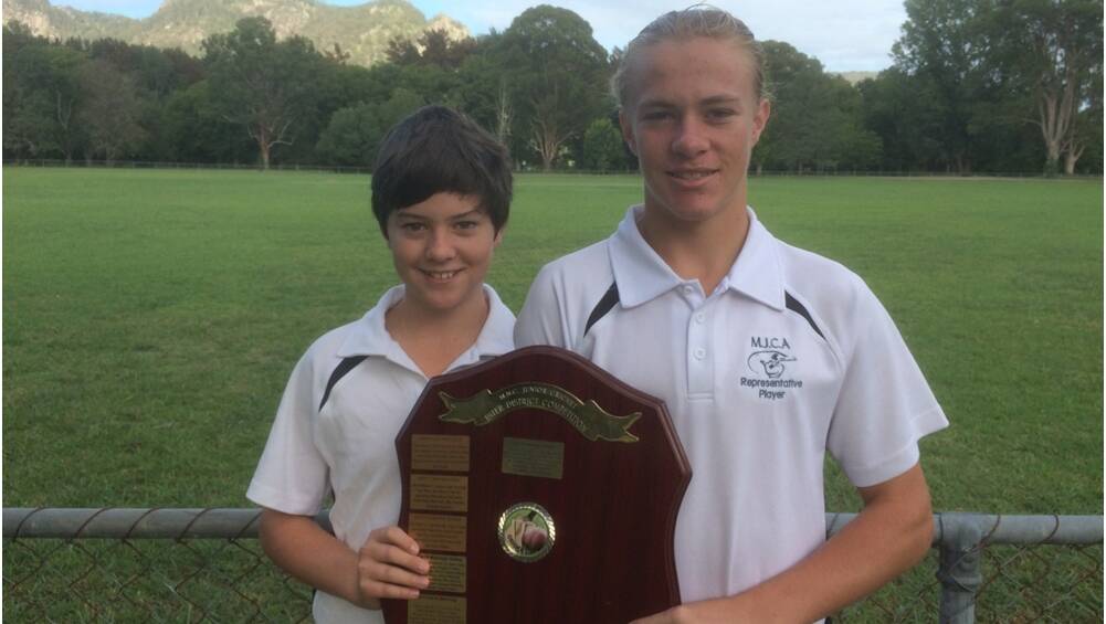 Gloucester cricketers James McLeod and Harry Clarke with the shield.