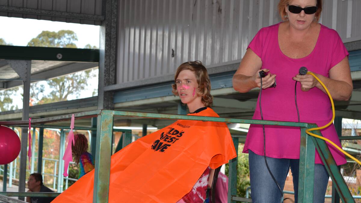 Gloucester High student Ryan Yates raised $3000 for breast cancer research by shaving his head last Wednesday.