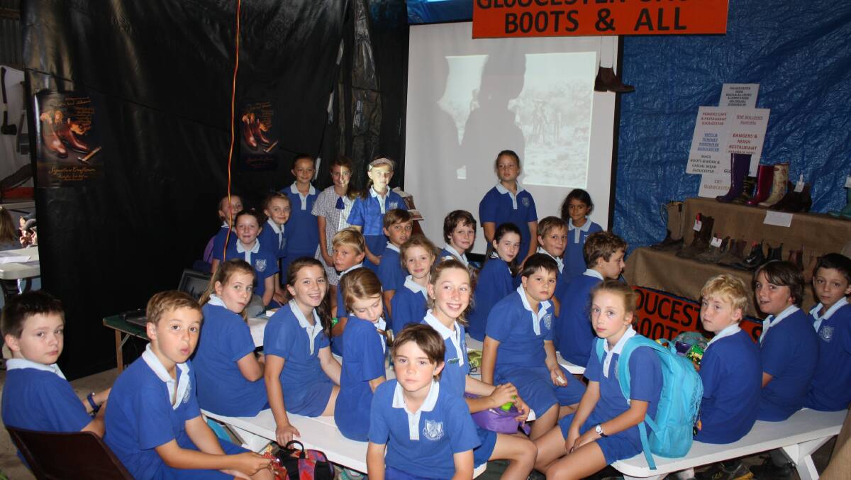 Students from Barrington Public enjoying an historic film at the 'Boots and All' display.