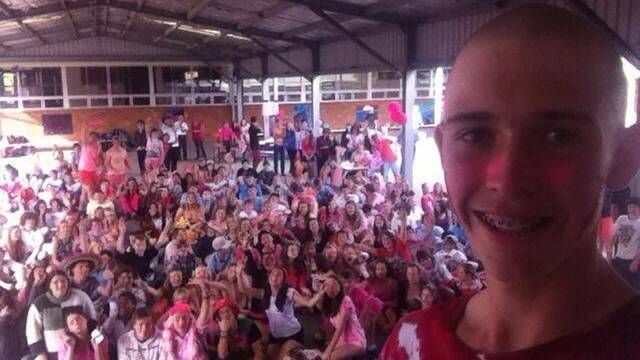 A selfie taken by Ryan Yates of his shaved head and students from Gloucester High at the pink mufti day held at the school last Wednesday.