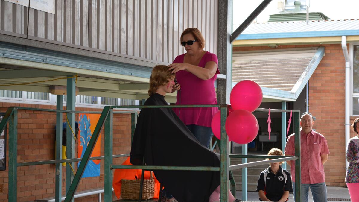 Gloucester High student Ryan Yates raised $3000 for breast cancer research by shaving his head last Wednesday.