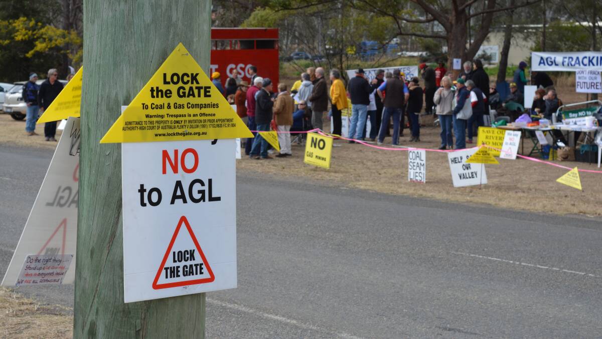 Protesters opposed to AGL's coal seam gas operations in Gloucester gathered outside the company's local headquarters late last year. AGL has informed the EPA that a chemical it uses in its fracking process has shown up in water monitoring.