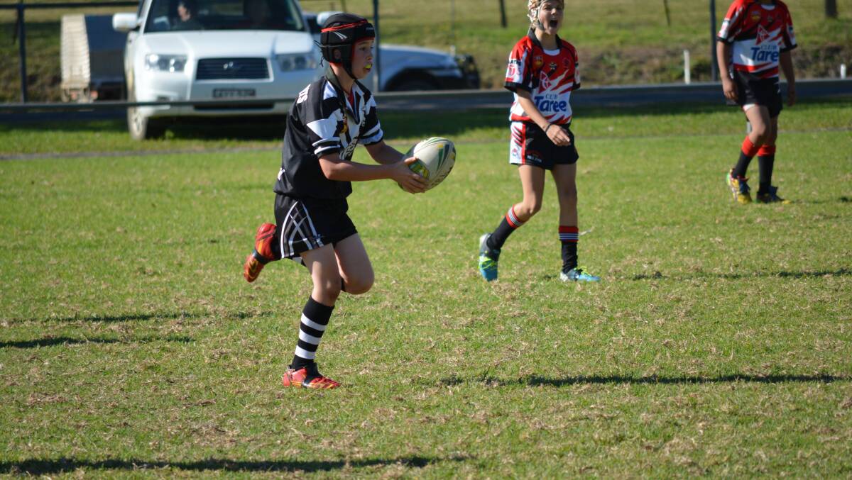 Harrison Moore in action for the Magpies under 11s.